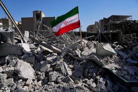 “Iranian flag standing among rubble and destroyed buildings, symbolizing devastation and resilience after destruction
